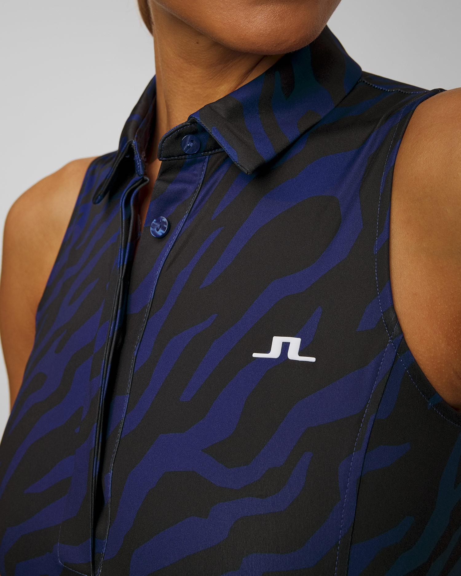 Dámská funkční polokošile bez rukávů J.Lindeberg Dena Print Sleeveless Top v Tmavě Modrém a Černém Barevném Provedení