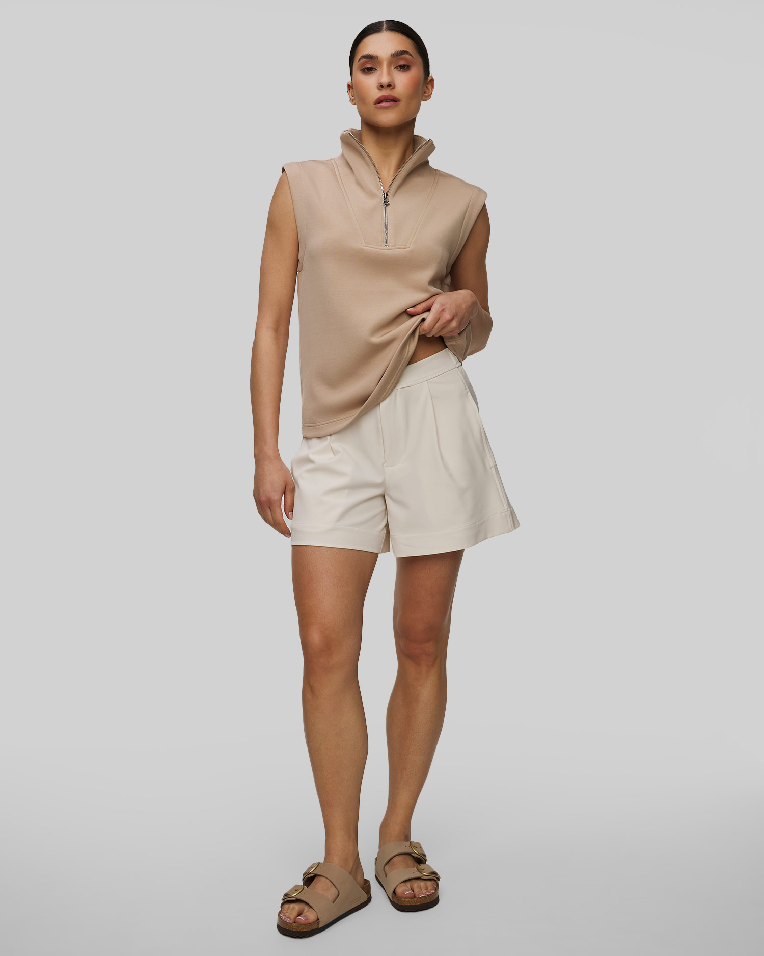 Beżowa bluza bez rękawów damska Varley Magnolia Half Zip Tank 2.0, Kolor/Wzór: Beżowy