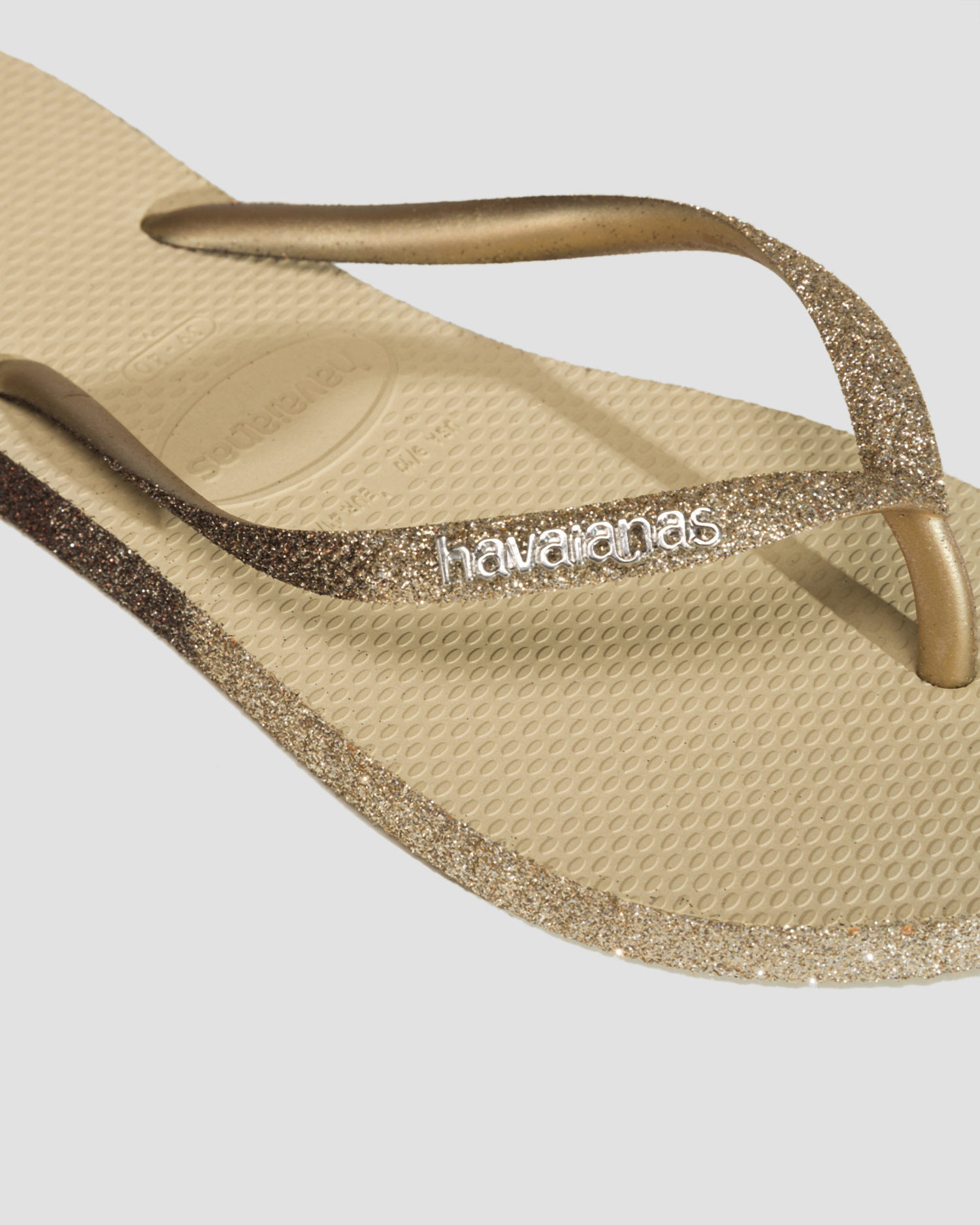 Złote japonki Havaianas Slim Sparkle Me