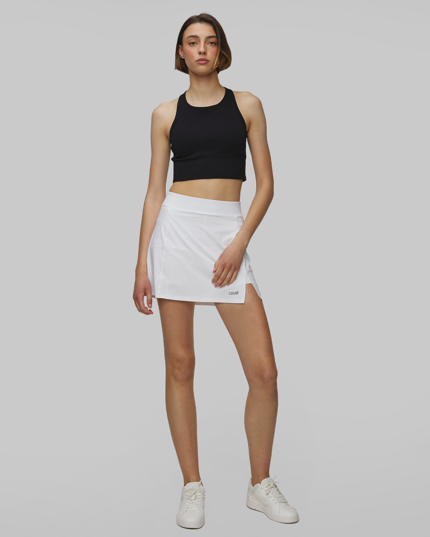 Jupe de tennis blanc pour femmes Casall Court Court Slit Skirt, Couleur: Biały