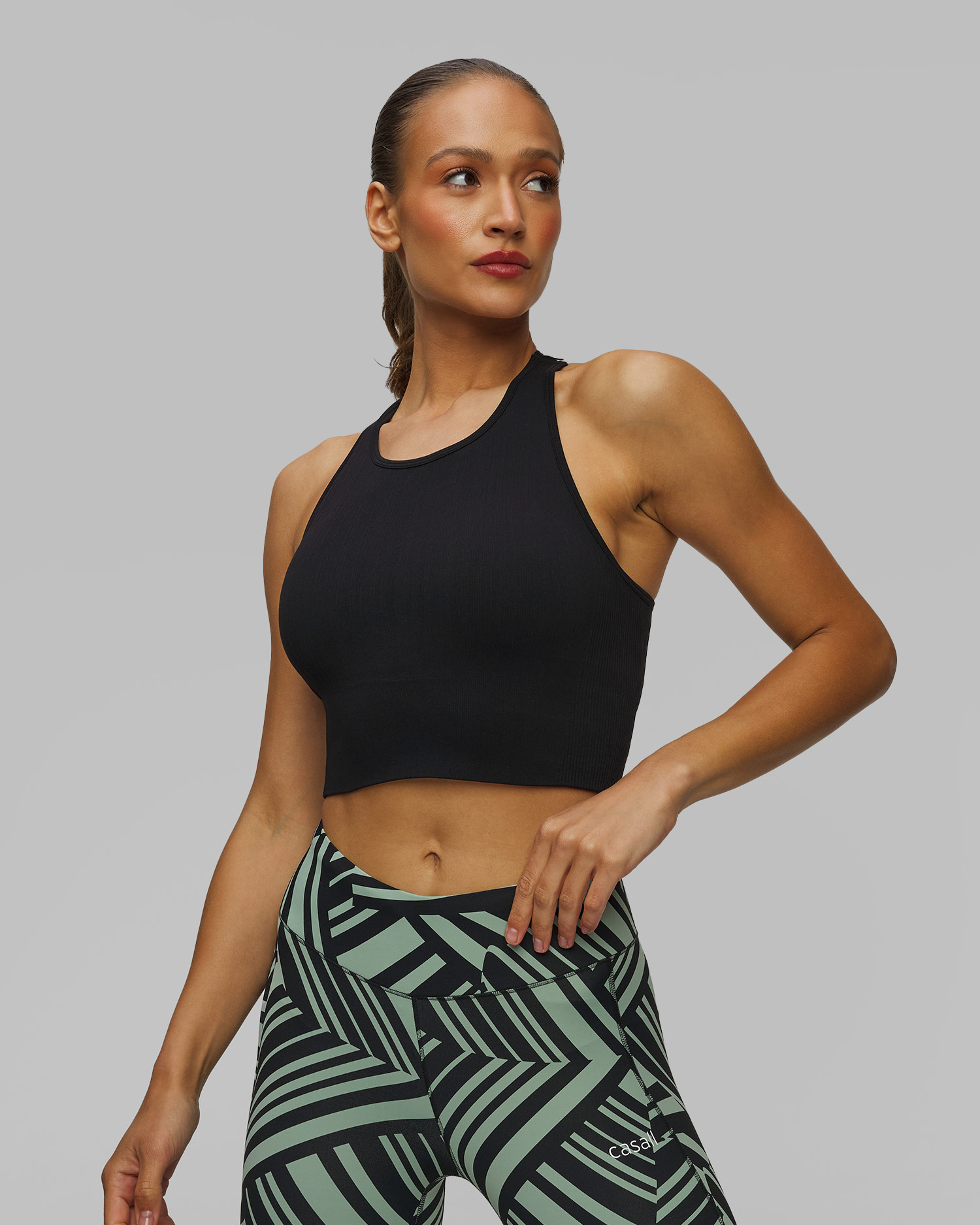 Dámský sportovní top Casall Multi Rib Seamless Padded Sports Top v Černé Barvě