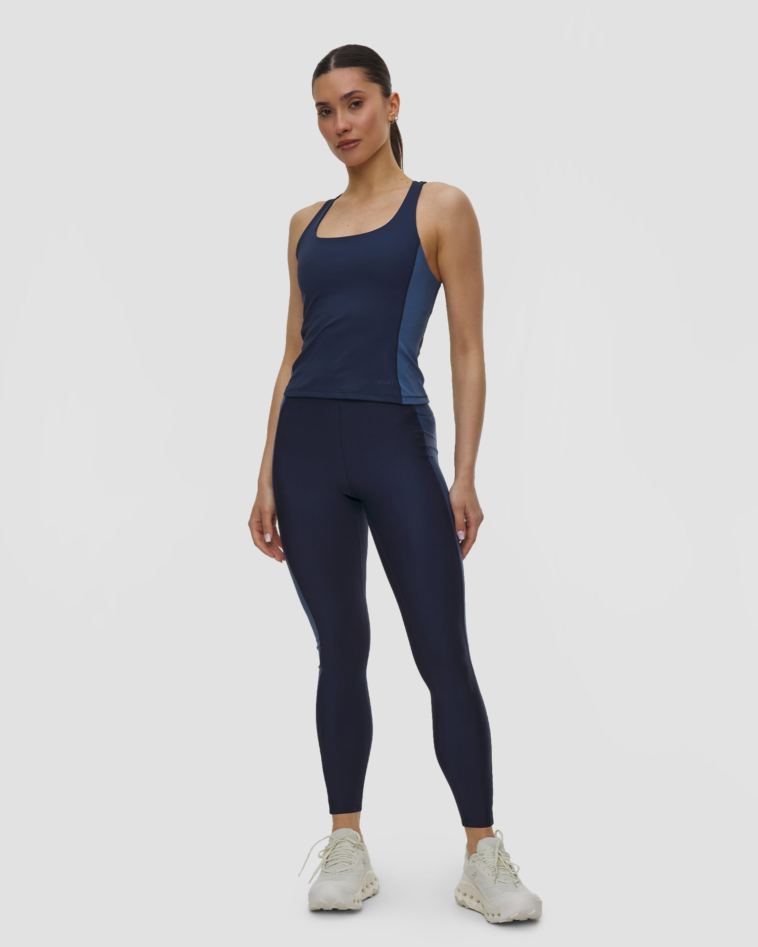 Tmavě modrá dámská sportovní podprsenka Casall Shaped Block Built In Bra Tank