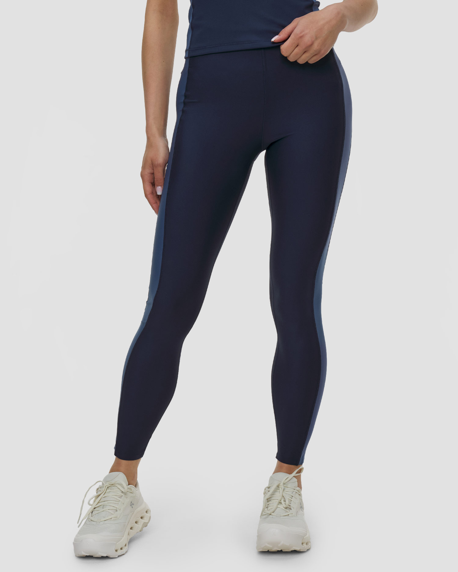 Sportovní dámské legíny s vysokým pasem Casall Shaped Block High Waist Tights v tmavě modrém barevném provedení