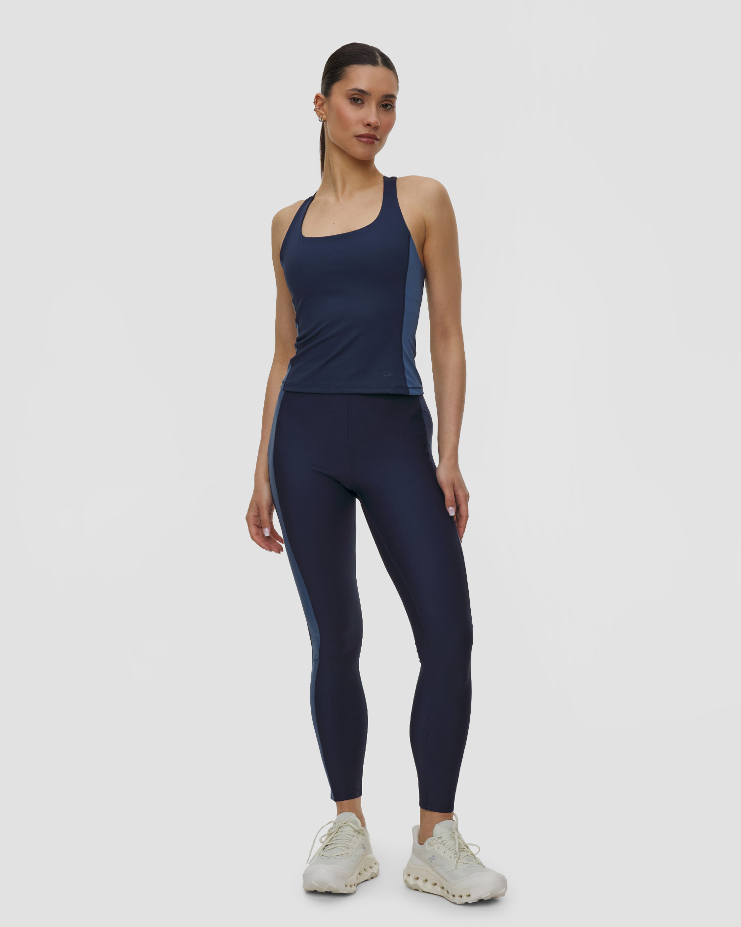 Sportovní dámské legíny s vysokým pasem Casall Shaped Block High Waist Tights v tmavě modrém barevném provedení