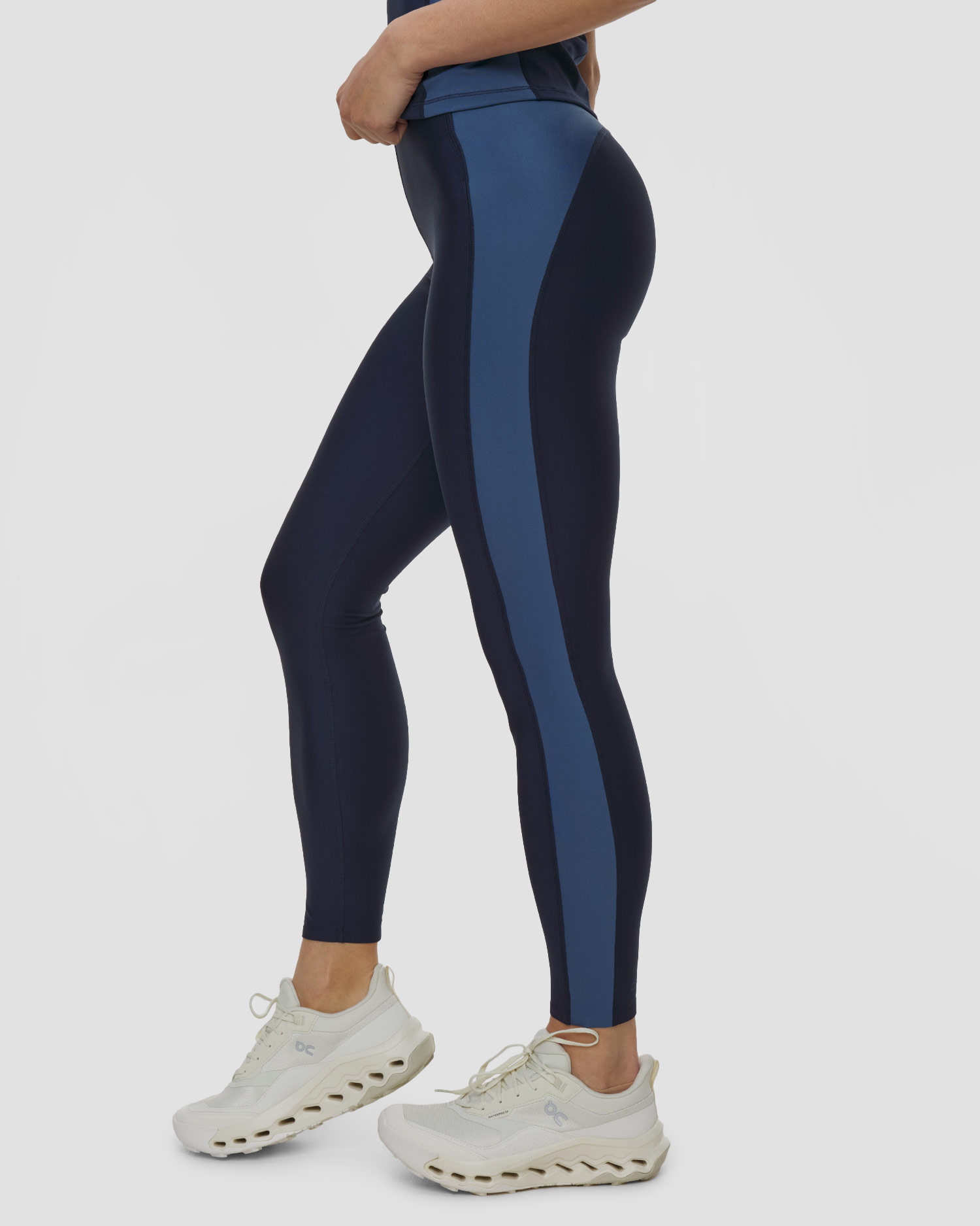 Sportovní dámské legíny s vysokým pasem Casall Shaped Block High Waist Tights v tmavě modrém barevném provedení