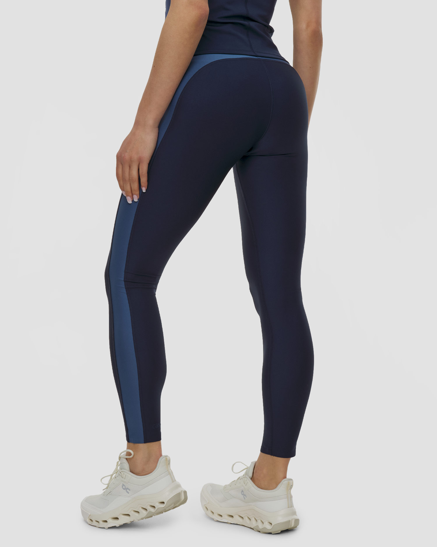 Sportovní dámské legíny s vysokým pasem Casall Shaped Block High Waist Tights v tmavě modrém barevném provedení